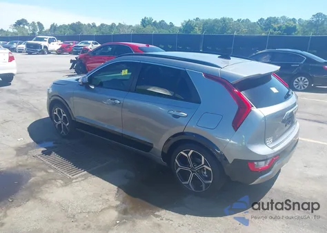 2023 Kia Niro Ex Touring z USA, uszkodzony, nr VIN KNDCR3LE7P5058017